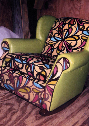 Large easy chair rocker upholstered in retro fabric and naugahyde