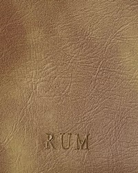 Derma Performance Rum Faux Leather by   