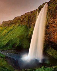 Waterfall In Iceland Wall Mural by  Brewster Wallcovering 