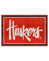 Nebraska Cornhuskers 5ft. x 8 ft. Plush Area Rug  in Huskers in  Red by   
